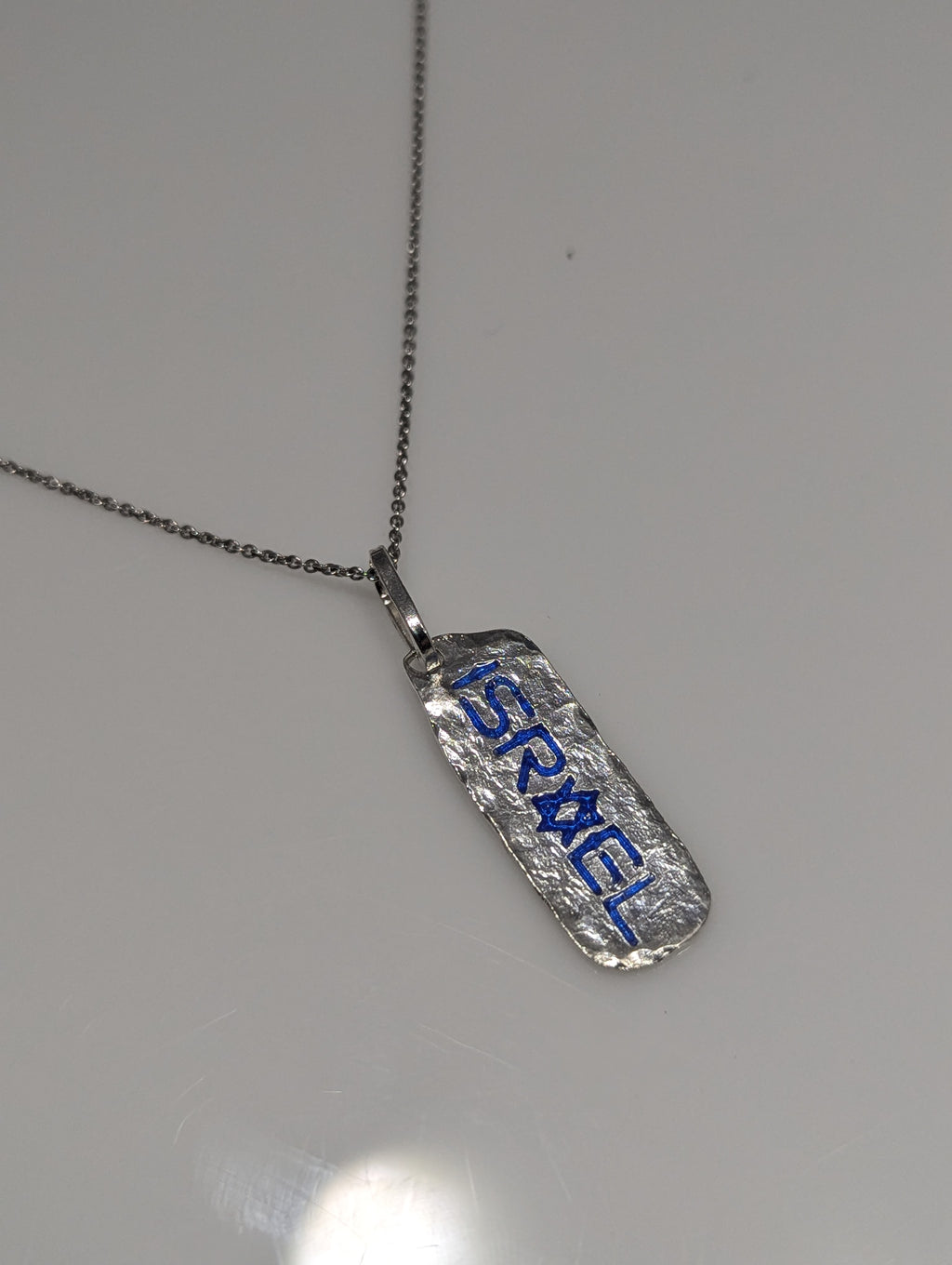 Israel Sterling Silver and Enamel tag