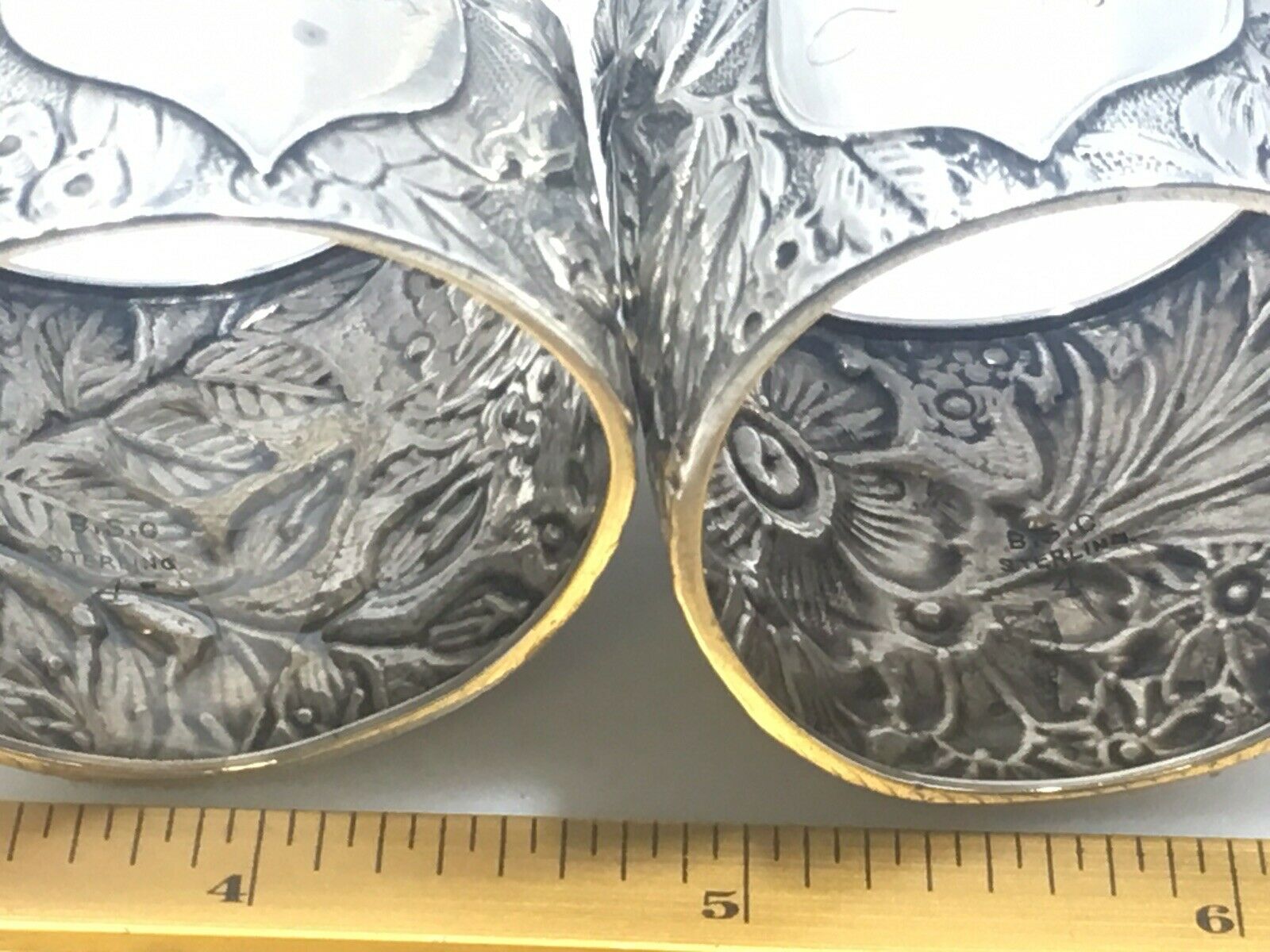 Pair Of Antique Sterling Silver Repousse Floral Napkin rings C 1900