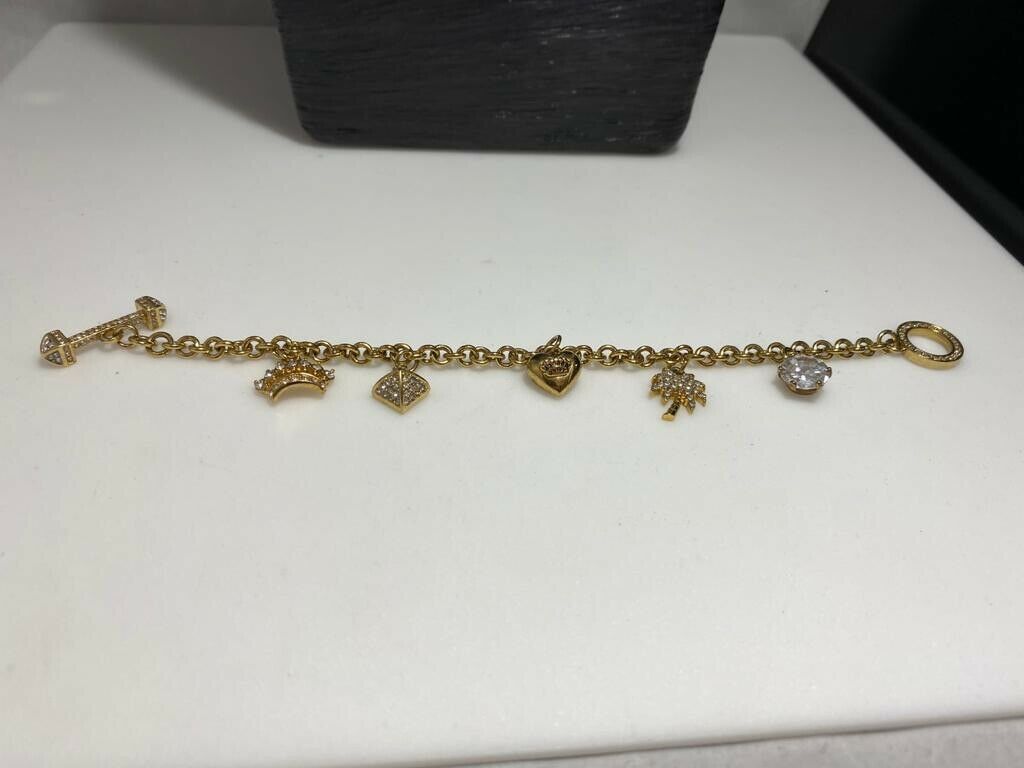 RARE Juicy Couture Blinged Out Charm Bracelet W 5 Charms & Awesome Clo –  Reuven Kassai - Shop Online