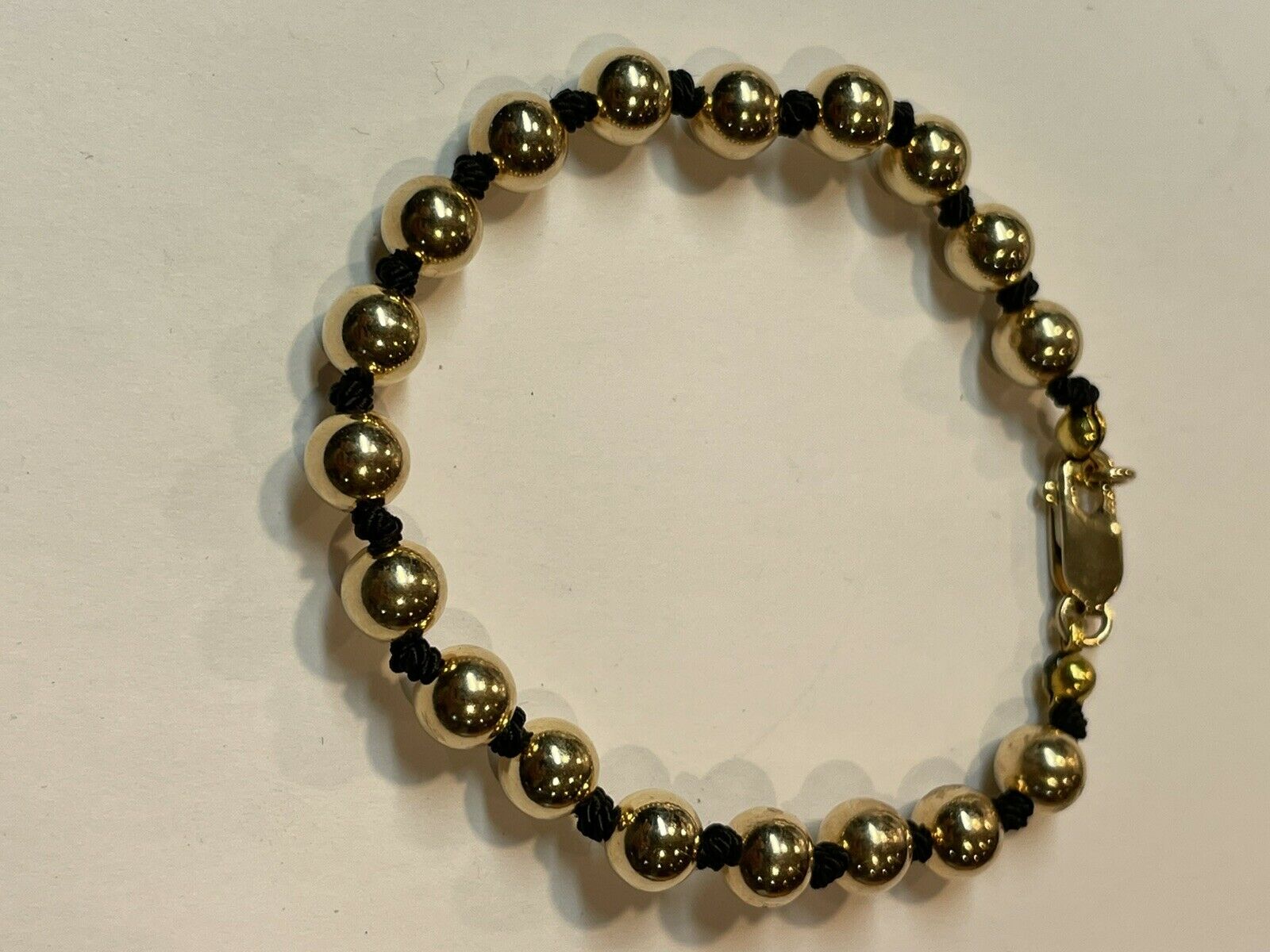 14k Gold Bead And Silk Bracelet with Lobster Clasp 7mm Beads 7”