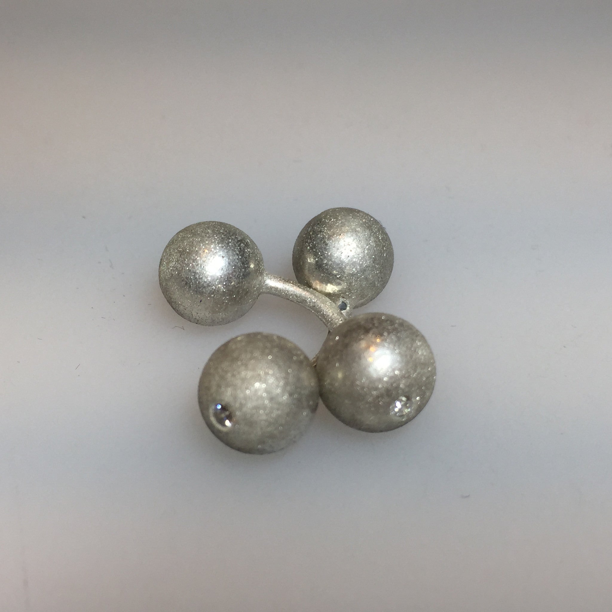 Sterling Silver and diamond barbell cufflink